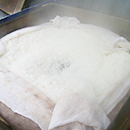 一升餅の米蒸す写真